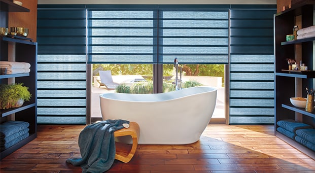 These Hunter Douglas Roman window shades  highlight the characteristic soft fabric folds of roman shades.