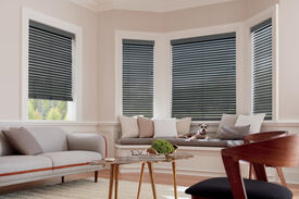 Horizontal metal window blinds for bay windows and double hung windows.