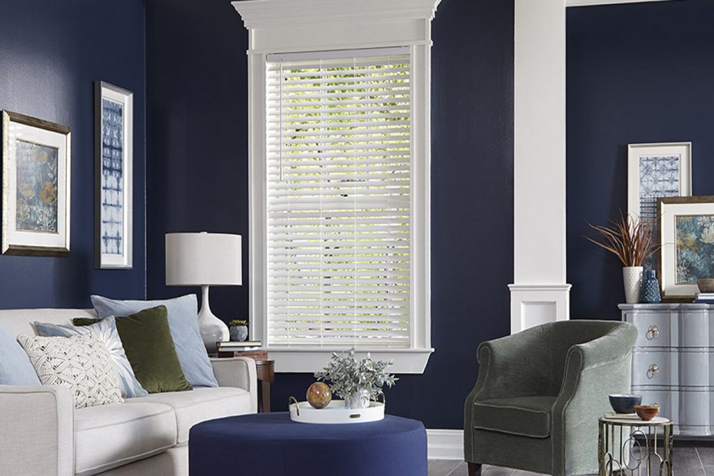 Pinnacle PrivacyPlus horizontal blinds on a window in a formal living room.
